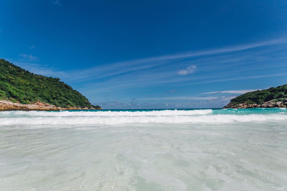 Long Beach Coral Island Phuket with beach chairs and crystal clear sea